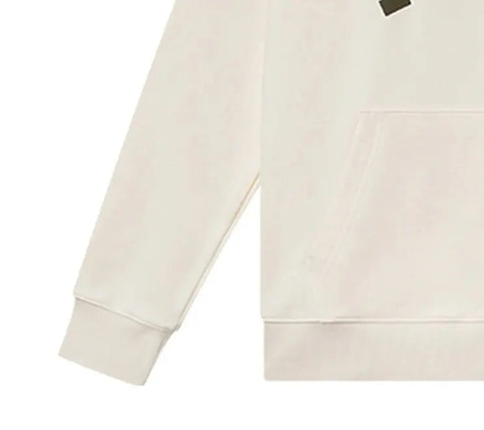 New Balance 1906 cream sweatpants with elastic cuffs and stitched hem