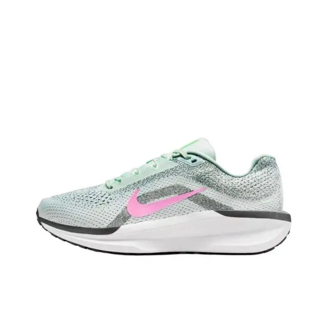 Light blue knit running shoe with pink Swoosh, mint laces, white sole.
