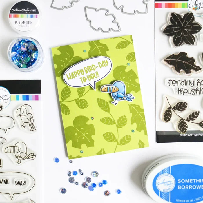 Catherine Pooler - Stamp and Die Set - In the Tropics Floral. Use the In the Tropics Floral Stamps and Dies for layers and layers of floral inspiration. Illustrated by Kat Uno. Available at Embellish Away located in Bowmanville Ontario Canada. Card example by brand ambassador.
