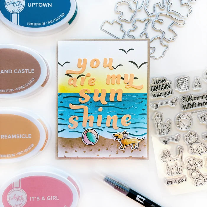 Catherine Pooler - Stencil - Sand & Sea. This smart stencil has four sides cut to use for blending clouds, waves, and the sandy beach edge. Add texture to the water and sand with the inside elements of the stencil. Add pair of seagulls in the distance. Available at Embellish Away located in Bowmanville Ontario Canada. Card example by Catherine Pooler.