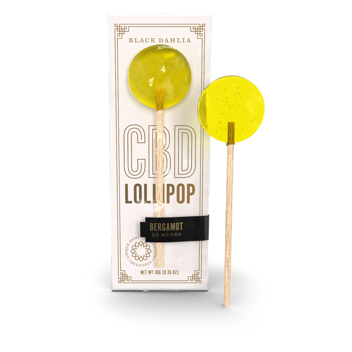 CBD bergamot lollipops, two yellow round candy suckers on wooden sticks, 20 mg CBD each