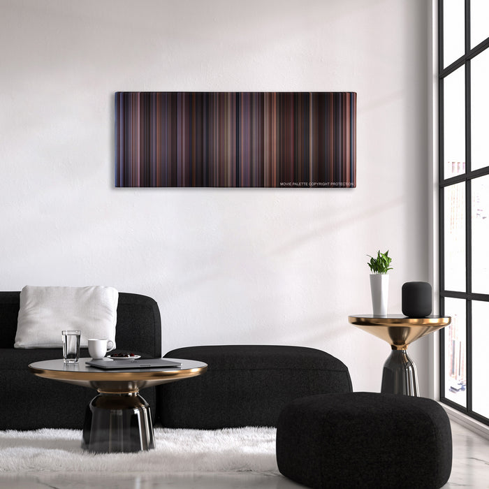 Chocolat color palette canvas above a black sofa with a gold-topped table