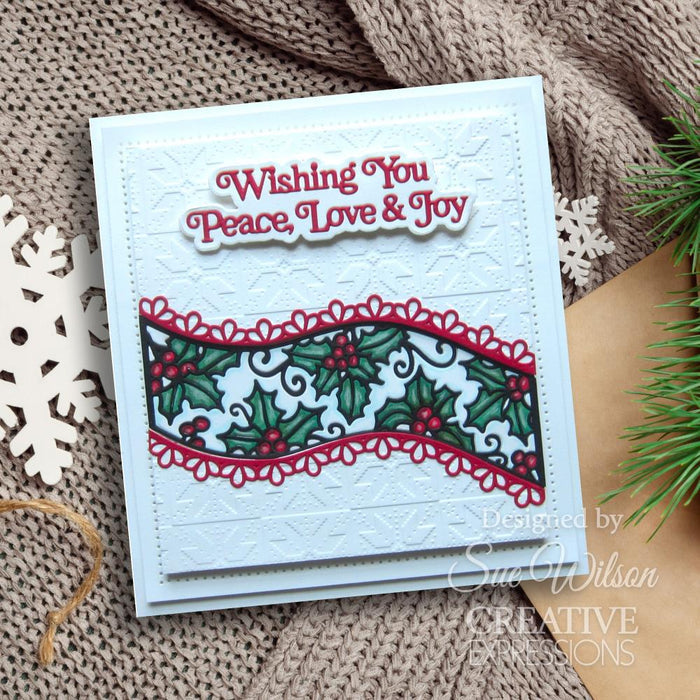 Creative Expressions - Craft Dies By Sue Wilson - Festive Holly - Ribbon Wave. This Festive Holly Ribbon Wave is a gorgeous die set that will be a great addition to your festive paper craft stash. Available at Embellish Away located in Bowmanville Ontario Canada. Card example by Sue Wilson.