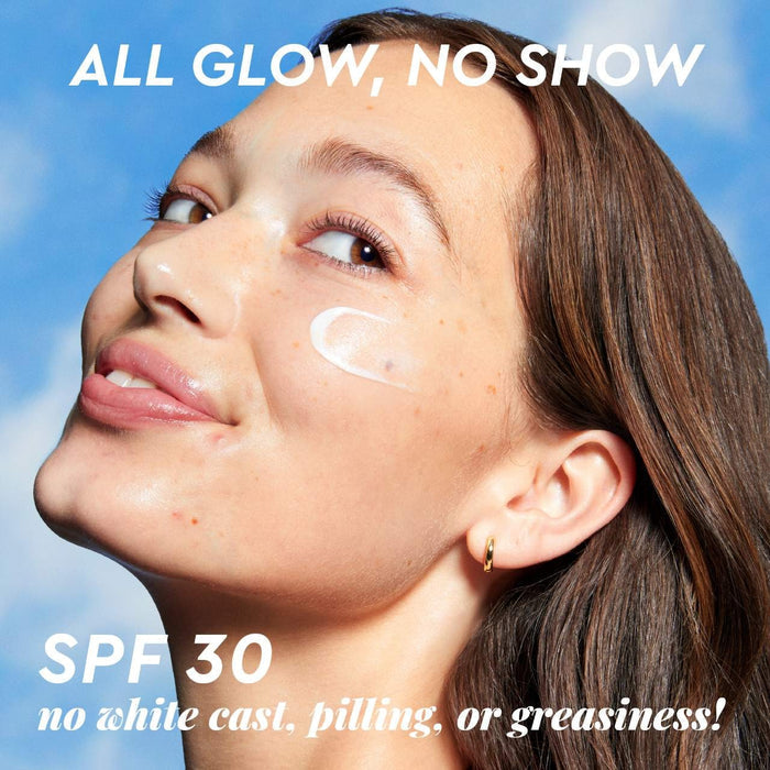 Glow Recipe Dewy Defense SPF 30 hydrating fluid sunscreen bottle with a sleek design and UV protection label.