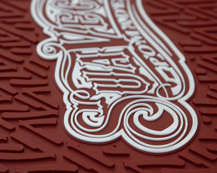 Red OG Script Barber Mat Closeup