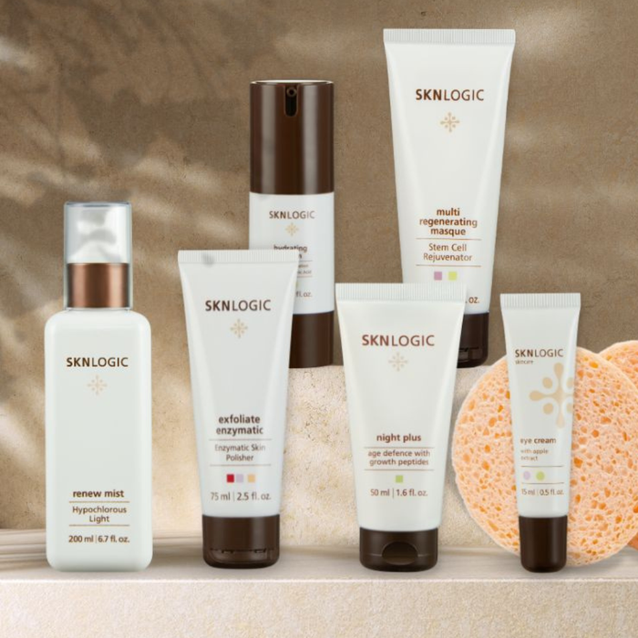 SKNKIT008 SKNLOGIC Age Defense Advance Retail Kit | Collection of SKNLOGIC skincare products on a neutral background