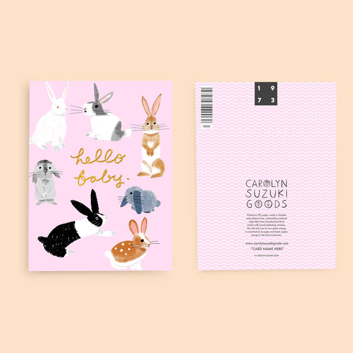 Baby card back with barcode, pink zigzag pattern, and “CAROLYN SUZUKI GOODS” text