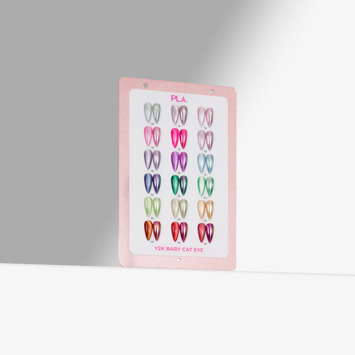 A pink swatch showing multiple cat eye nail polish nail tip swatches arranged in a grid, photographed against a clean light gray studio background.