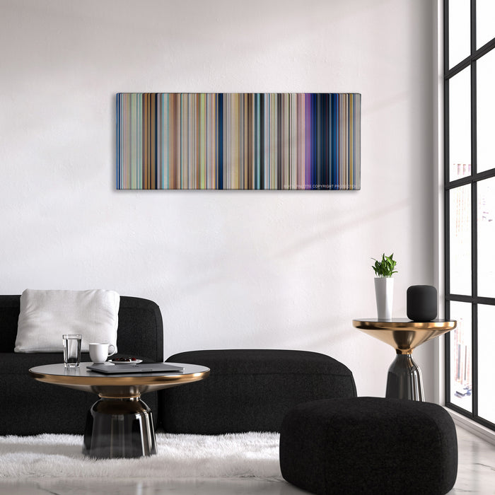 Your Name. color palette canvas above a black sofa with a gold-topped table