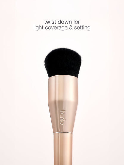 Makeup brush with black bristle tip on a white background, featuring the brand 'e.l.f.'