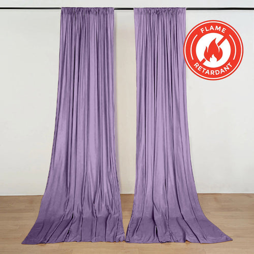 Purple flame retardant curtains hanging on a wall with fire safety logo