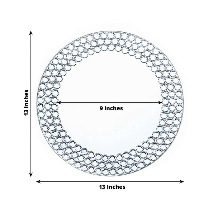 Decorative round mirror with lace-like design, 13 inches diameter, 9 inches inner circle.