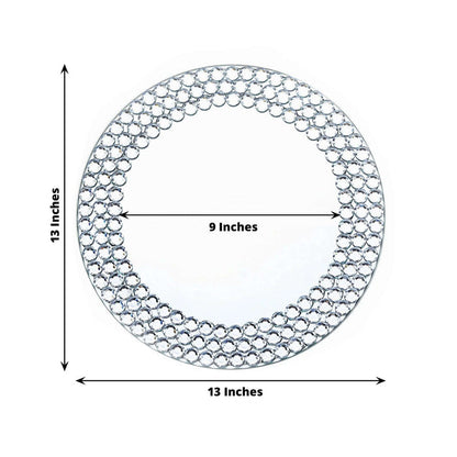 Decorative round mirror with lace-like design, 13 inches diameter, 9 inches inner circle.