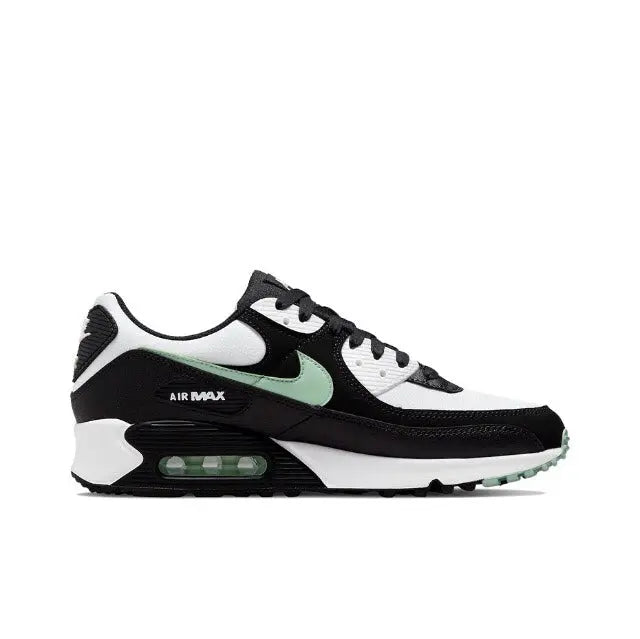 Air Max 90 sneaker in white, black and dark green with visible Air unit