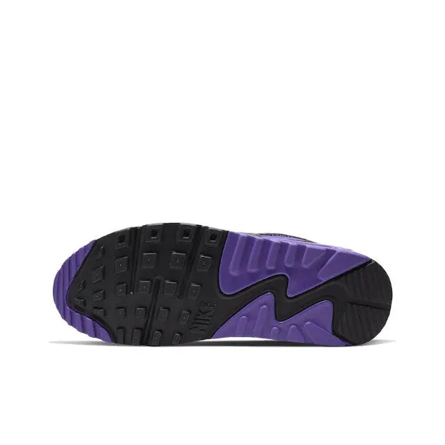 Black and purple rubber sneaker outsole with tread pattern