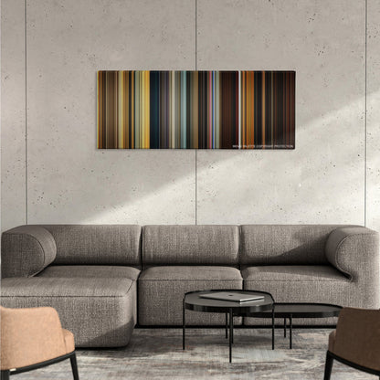 Apocalypse Now color palette canvas on a concrete wall above a gray sectional sofa