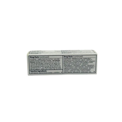 Box showing drug facts and inactive ingredients for a skin tint product with SPF.