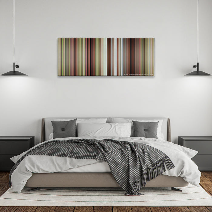 Caddyshack color palette canvas above a bed, between two black pendant lamps