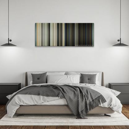 Captain Phillips color palette canvas above a bed, between two black pendant lamps