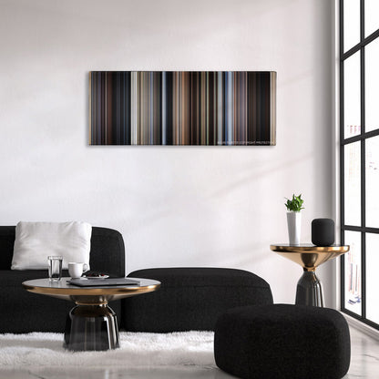 Cast Away color palette canvas above a black sofa with a gold-topped table