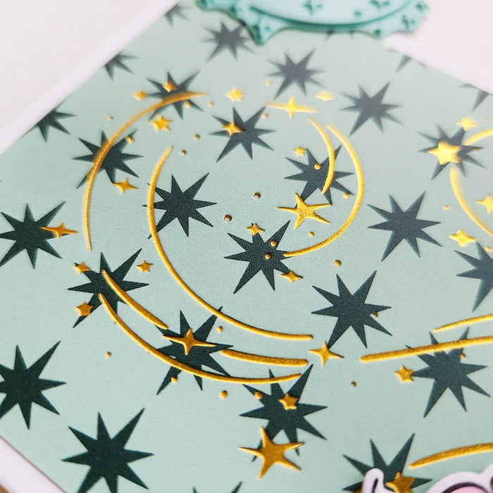 Catherine Pooler - Hot Foil Plates - It's Magic. Bring a touch of holiday enchantment to your projects. Inspired by swirling snow and blowing leaves, this plate features a mesmerizing swirl of dazzling stars that adds Christmas magic to your cards. Available at Embellish Away located in Bowmanville Ontario Canada.