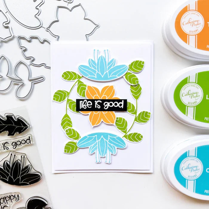 Catherine Pooler - Stamp and Die Set - In the Tropics Floral. Use the In the Tropics Floral Stamps and Dies for layers and layers of floral inspiration.  Illustrated by Kat Uno. Available at Embellish Away located in Bowmanville Ontario Canada. Card example by brand ambassador.