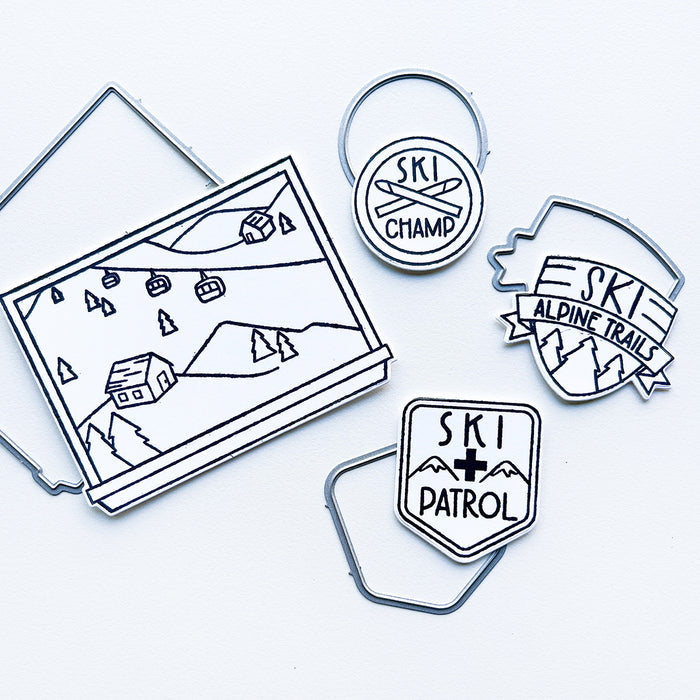 Catherine Pooler - Stamp & Dies - Ski Lodge. The Ski Lodge Stamp Set gives you a view of the mountain along with badges and sentiments for adorable snowy card making! You can also add Alpine View Die for your wintery mix (Sold Separately). Available at Embellish Away located in Bowmanville Ontario Canada.