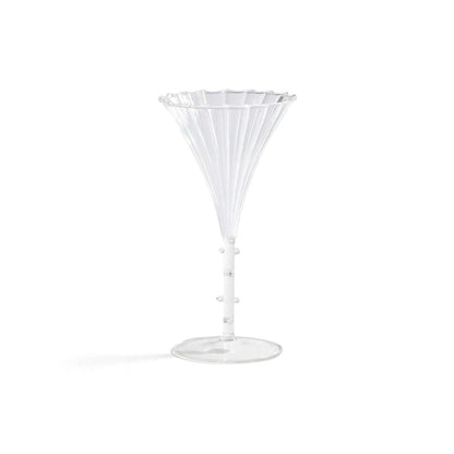 Clear martini glass on a white background