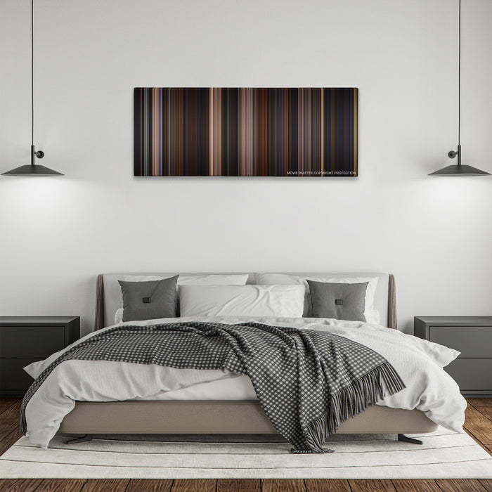 Chicken Run color palette canvas above a bed, between two black pendant lamps