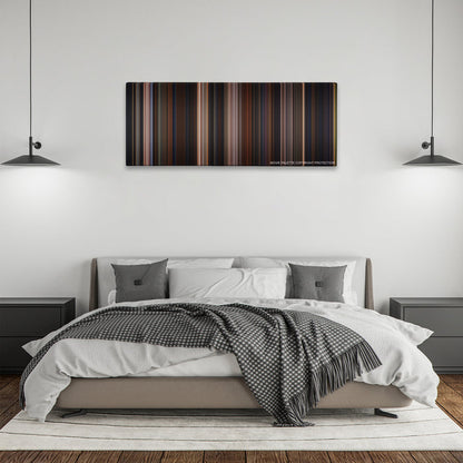 Chicken Run color palette canvas above a bed, between two black pendant lamps