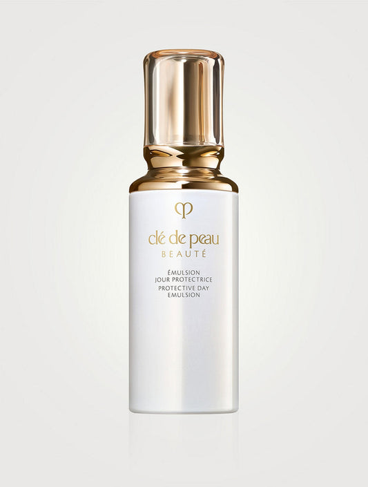 CLÉ DE PEAU BEAUTÉ Protective Day Emulsion bottle, 125ml, with elegant white packaging and silver accents.