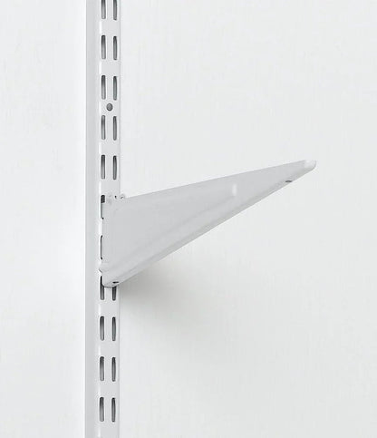 White metal shelf bracket mounted on vertical wall track for closet organization