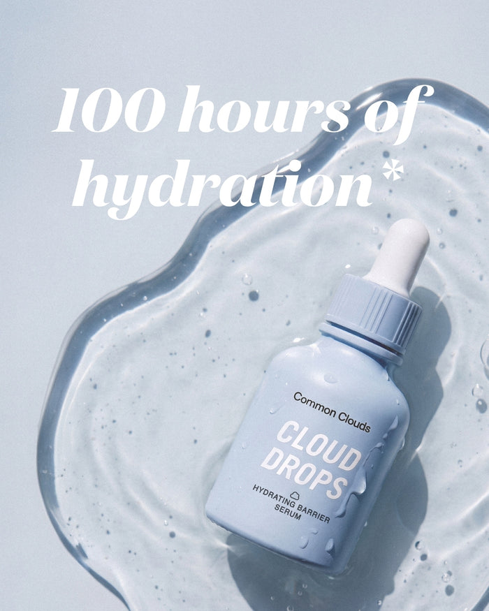 Common Clouds Cloud Drops hydrating barrier serum in a light blue dropper bottle, shown on a glossy gel texture with the text “100 hours of hydration.”