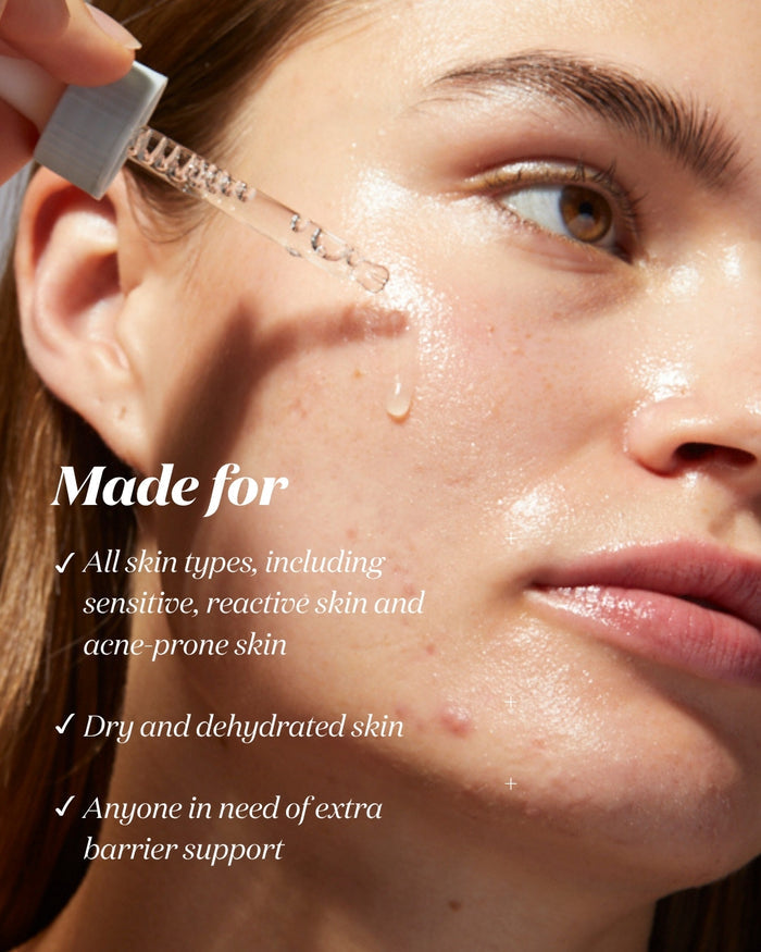 Woman applying Common Clouds Cloud Drops hydrating barrier serum with a dropper. Bullet points describe it as suitable for all skin types, including sensitive, reactive and acne-prone skin, dry and dehydrated skin, and anyone needing extra barrier support.