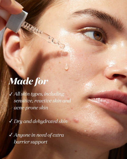 Woman applying Common Clouds Cloud Drops hydrating barrier serum with a dropper. Bullet points describe it as suitable for all skin types, including sensitive, reactive and acne-prone skin, dry and dehydrated skin, and anyone needing extra barrier support.