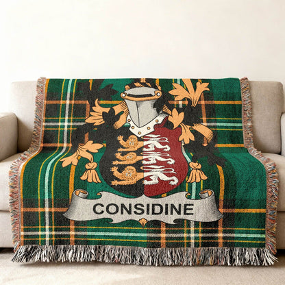 Considine crest woven through an Irish National Tartan throw.