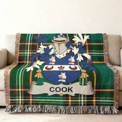 Cook crest woven through an Irish National Tartan cotton throw.