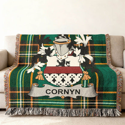 Cornyn crest woven into an Irish National Tartan cotton throw.
