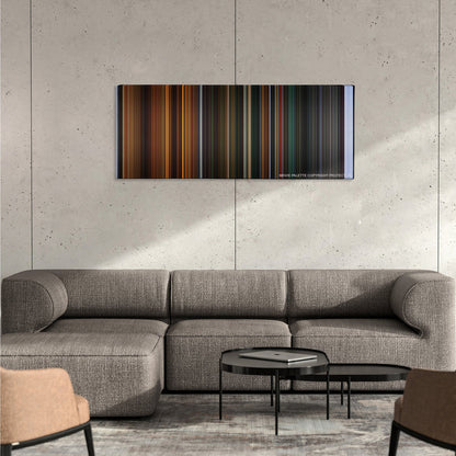 Crimson Peak color palette canvas on a concrete wall above a gray sectional sofa