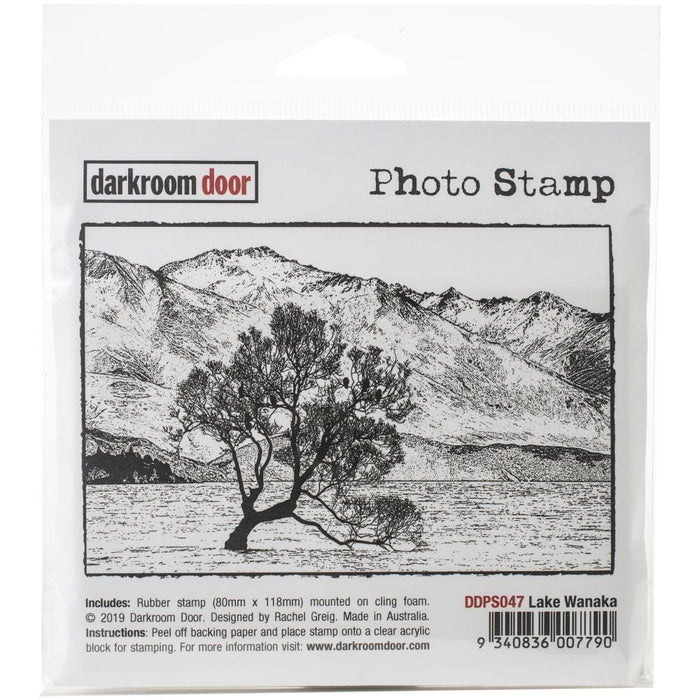 Darkroom Door - Photo Cling Stamp 4.6"X3.2" - Lake Wanaka. These detailed stamps are the perfect way to add fun images to your cards, scrapbook pages and more! Use with any clear acrylic block (sold separately). This package contains Lake Wanaka: One 4.5x3 inch stamp. Imported. Available at Embellish Away located in Bowmanville Ontario Canada.