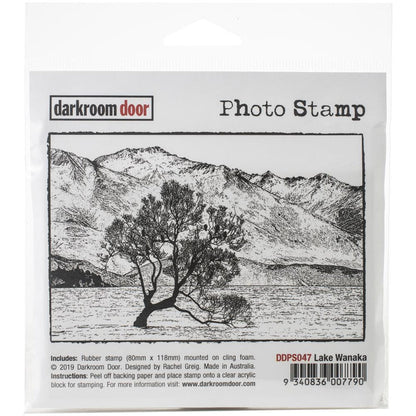 Darkroom Door - Photo Cling Stamp 4.6"X3.2" - Lake Wanaka. These detailed stamps are the perfect way to add fun images to your cards, scrapbook pages and more! Use with any clear acrylic block (sold separately). This package contains Lake Wanaka: One 4.5x3 inch stamp. Imported. Available at Embellish Away located in Bowmanville Ontario Canada.