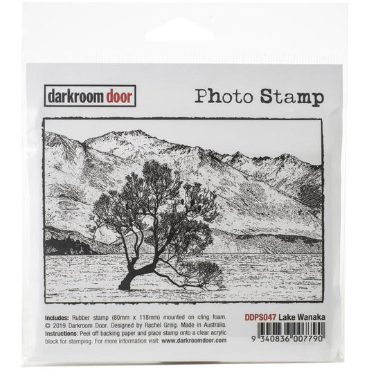 Darkroom Door - Photo Cling Stamp 4.6"X3.2" - Lake Wanaka. These detailed stamps are the perfect way to add fun images to your cards, scrapbook pages and more! Use with any clear acrylic block (sold separately). This package contains Lake Wanaka: One 4.5x3 inch stamp. Imported. Available at Embellish Away located in Bowmanville Ontario Canada.