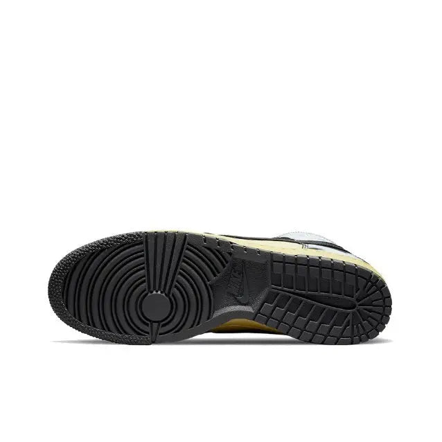 Nike Dunk High rubber outsole with black tread and grid grooves, underside view.