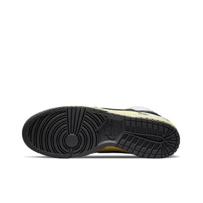 Nike Dunk High rubber outsole with black tread and grid grooves, underside view.