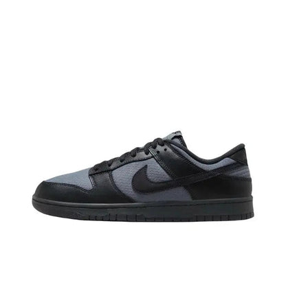 Nike Dunk Low low-top sneaker in dark navy and wolf gray, with black swoosh