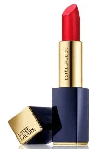 Red matte lipstick in gold and navy tube with visible Estee Lauder label, cap beside