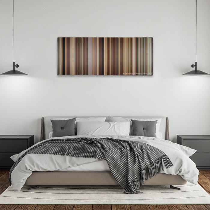 Evan Almighty color palette canvas above a bed, between two black pendant lamps