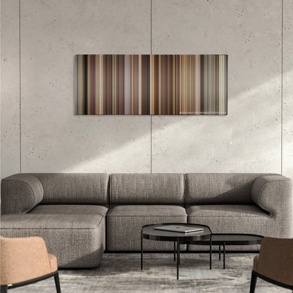Evan Almighty color palette canvas on a concrete wall above a gray sectional sofa