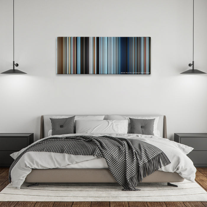 Everest color palette canvas above a bed, between two black pendant lamps