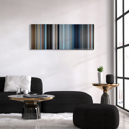 Everest color palette canvas above a black sofa with a gold-topped table
